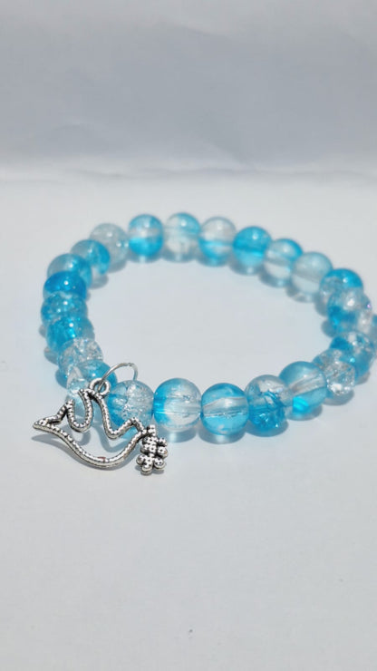 bracelets Multiple beaded, each with distinct colors and charms.