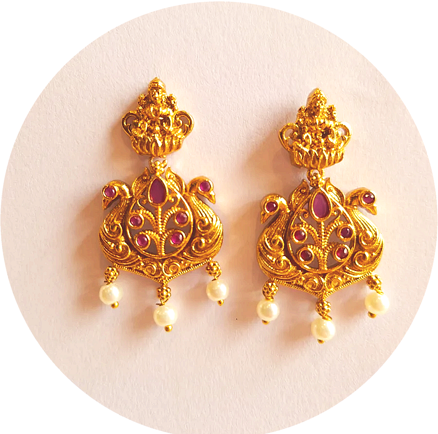 Exquisite Temple Earrings Adorned with Radiant Pink Ruby Stones