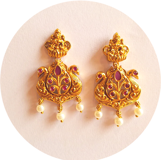 Exquisite Temple Earrings Adorned with Radiant Pink Ruby Stones
